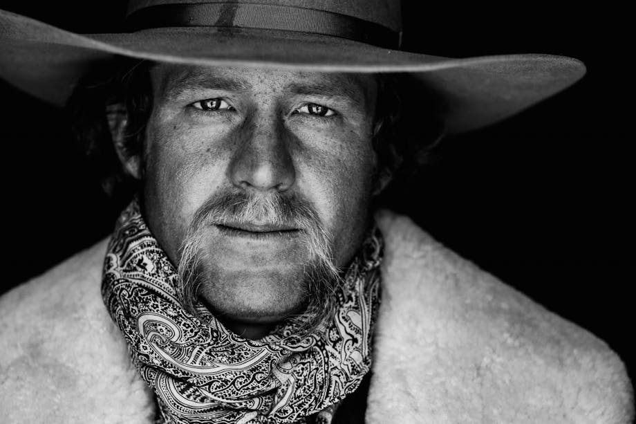 Filson Life - Wyoming Cowboy with bandanna, tan hat, and sheepskin