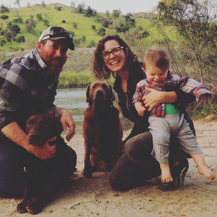 Chuck Ragan, Father's Day family with two dogs father mother and baby at river's edge