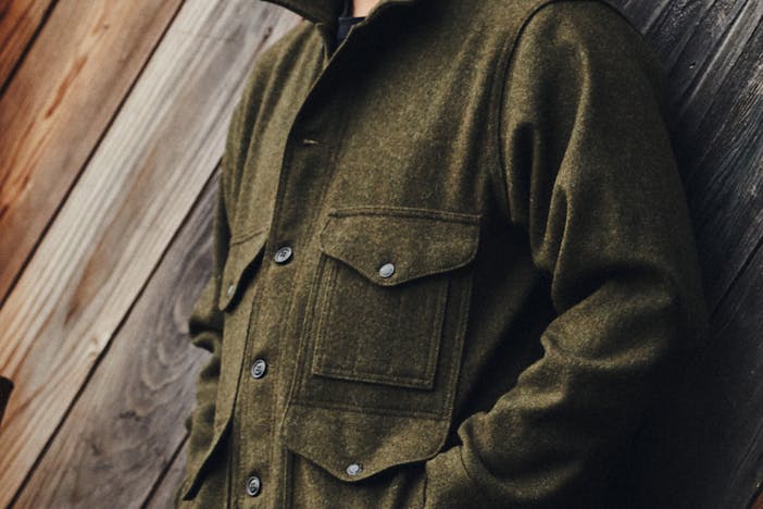 olive colored coat on body