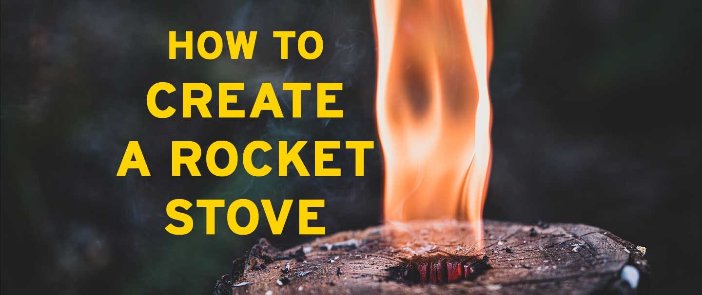 how to create a rocket stove. image of flame escaping central hole in a log
