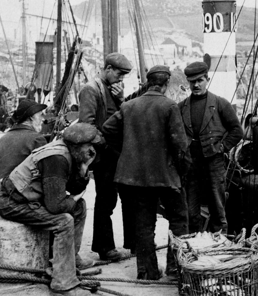 old black and white picture of men standing at shipyard wearing antiquated clothing