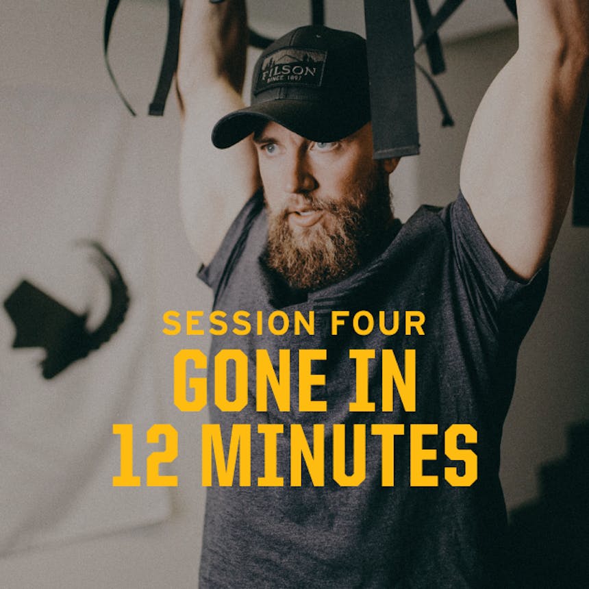 session four gone in 12 minutes image of man with arms over head standing in a gym