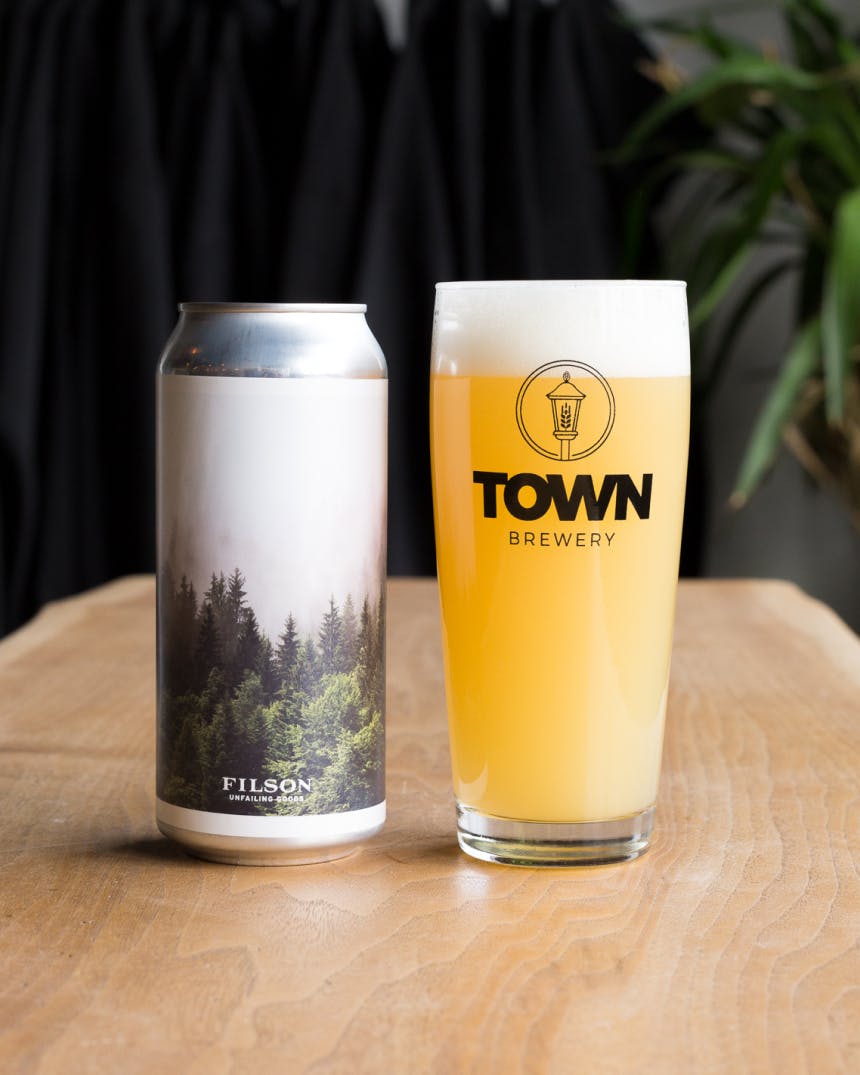 Glass with hazy golden beer and