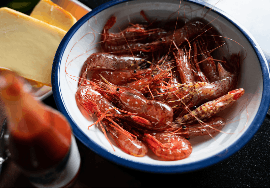 prawns in a blue rimmed bowl