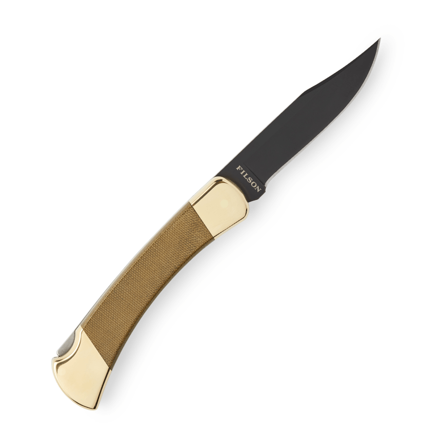 filson buck knife with gold handle and black blade