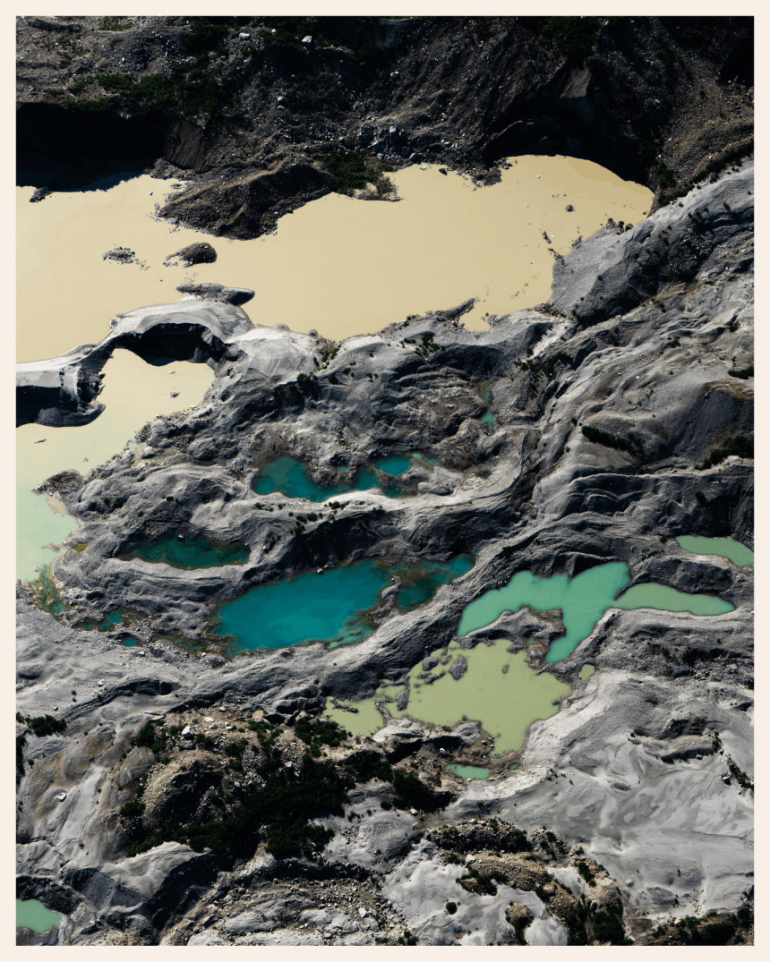 pools of aquamarine water amongst glacier ice
