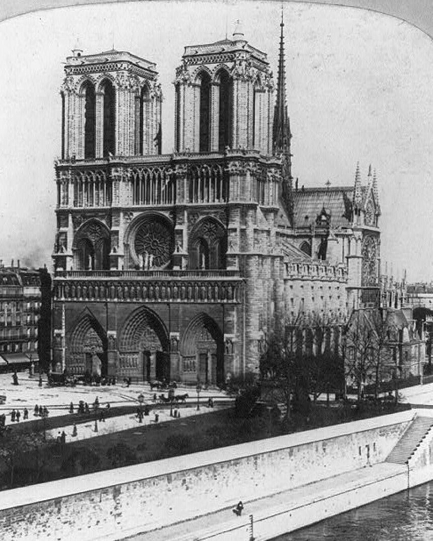 Archival black and white of Notre Dame in Paris, France