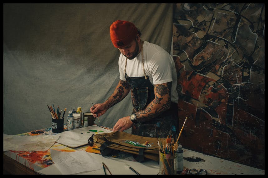 Artist Patric Hanley painting in New York loft studio space