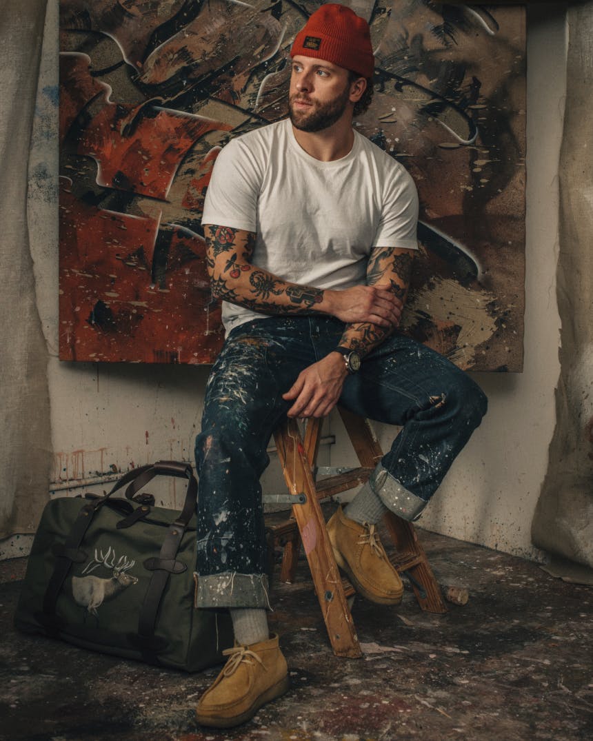 Artist Patric Hanley poses for portrait in New York loft studio space