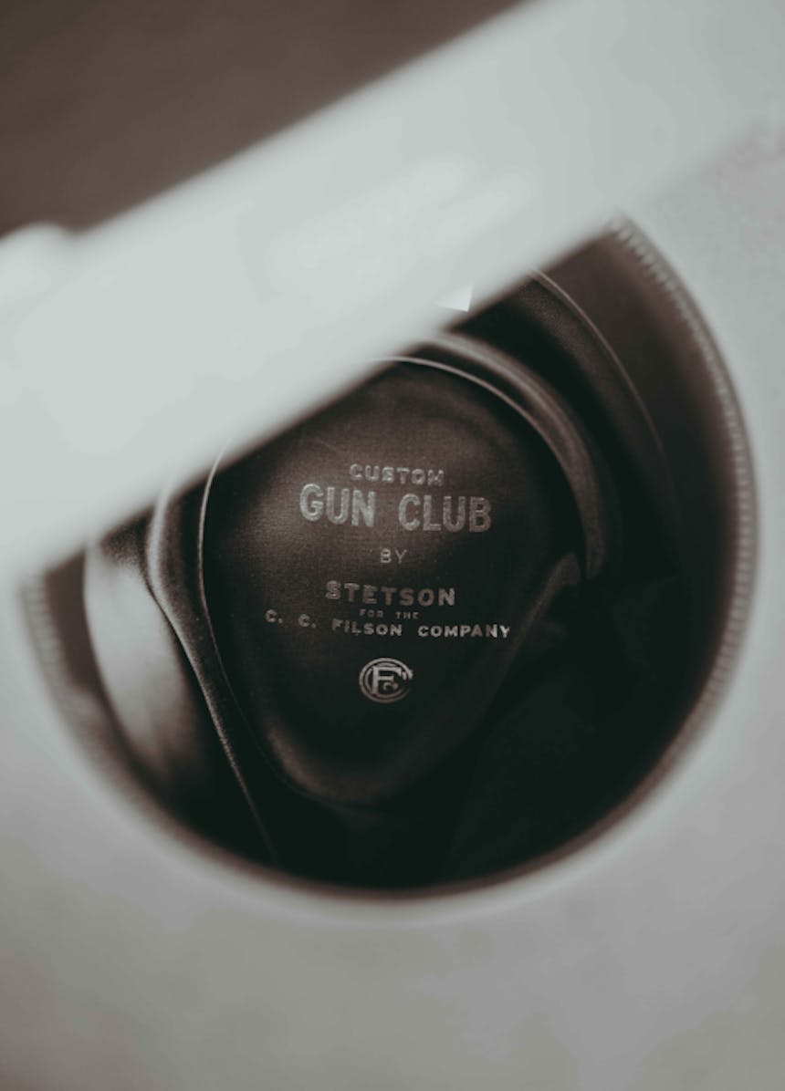 close up of the inside of a stetson cowboy hat, reading: custom gun club by stetson for the cc filson company