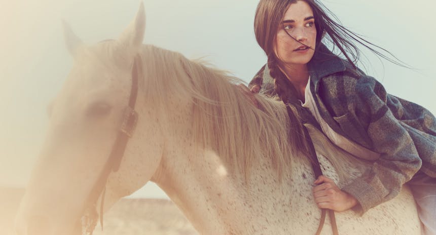 ava on horseback