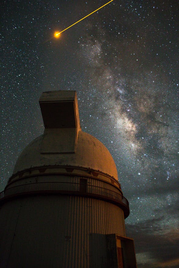 Milky Way: Mauna Kea Observatory. w/ laser from Observatory. Big Island, Hawaii