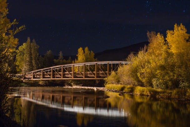 Jamieson Memorial Bridge. Autumn night on the Blue River: Silverthorne, Colorado. 