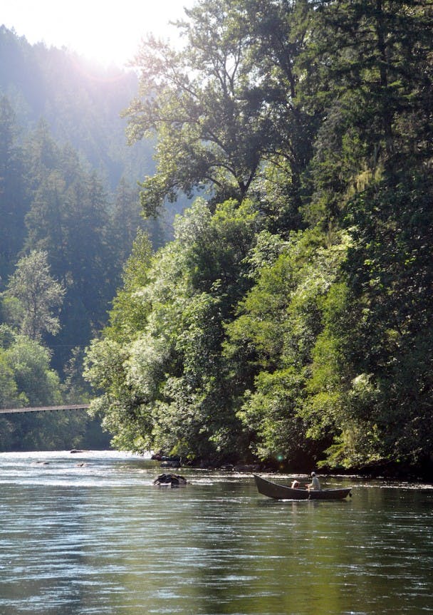 Our guide, Matt Ramsey, floats off in a classic McKenzie drift boat