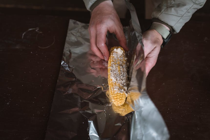 corn on the cob seasoned and slathered in butter