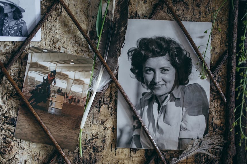 old photographs of Jane's mother on a tack board