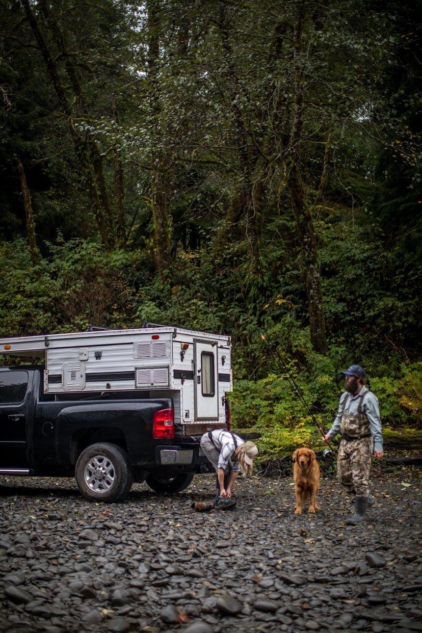 eric and his wife and dog getting ready at the river