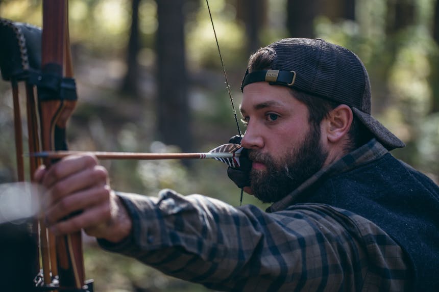 hunter shooting his bow