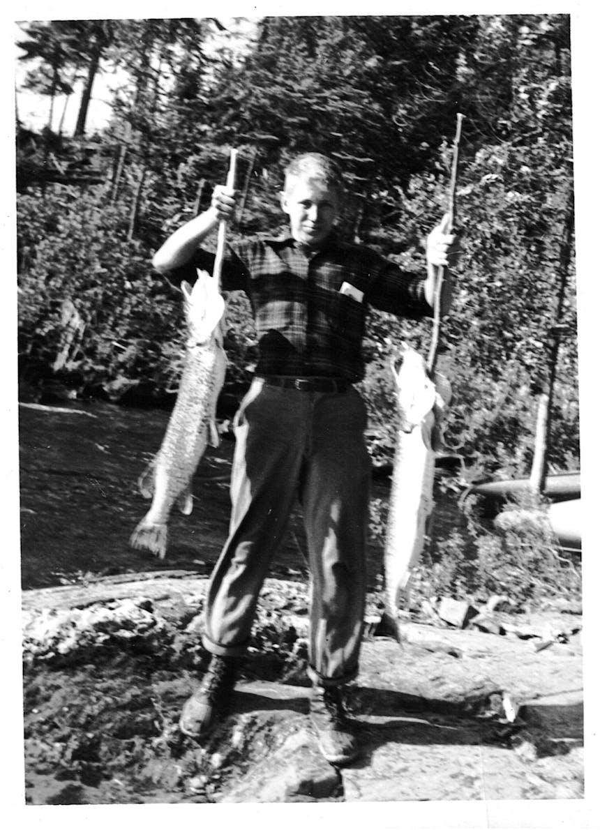 Poz with fish, 1960s