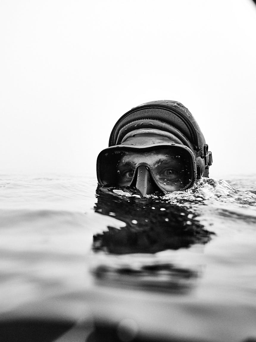 pat in the water with goggles and snorkel